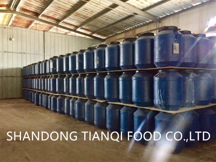 Plastic drum packing white mushroom in salted water